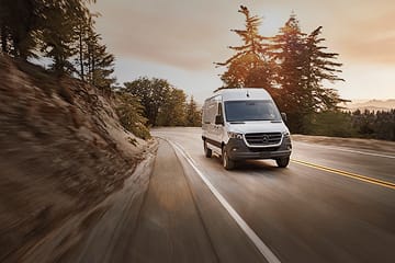 Van driving on road
